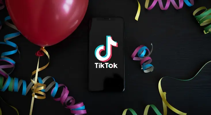 A smartphone displaying the TikTok logo.