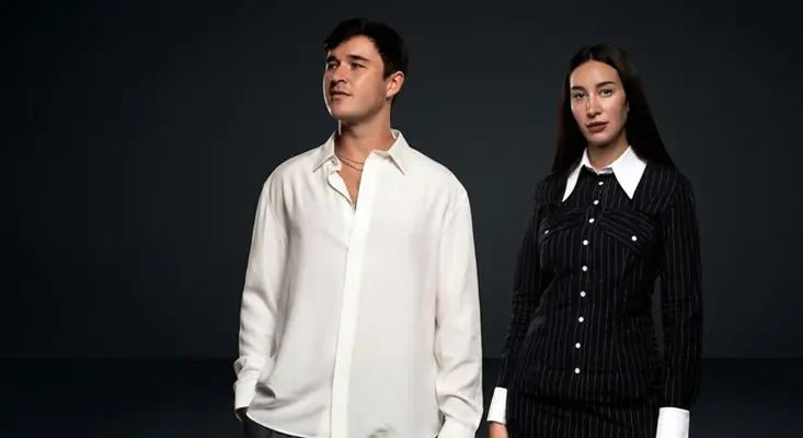 John Summit and Julia Wolf posing for the official WITH ME music video release on Experts Only.