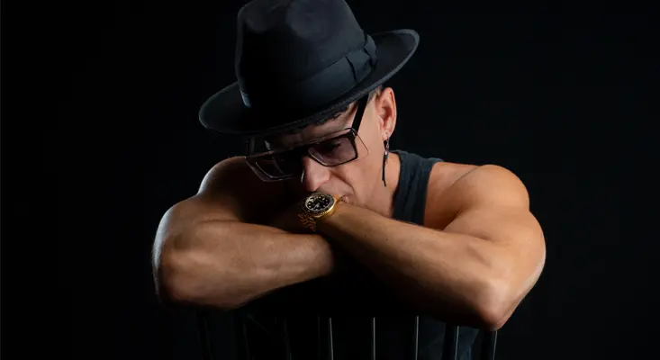 Timmy Trumpet Signals A Defining New Chapter On “Not A Place” Timmy Trumpet posing in a black hat and sunglasses, reflecting the emotional tone of his single "Not A Place" featuring Oaks.