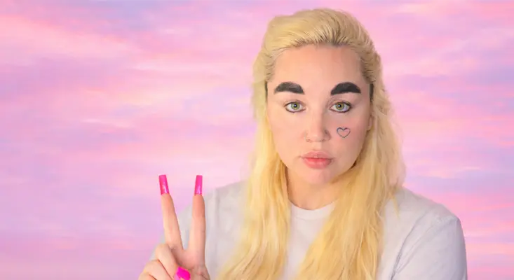Amanda Bynes Music Career Is Finally Real - Listen To “Girlfriend” Amanda Bynes music career era featuring blonde hair and heart face tattoo.