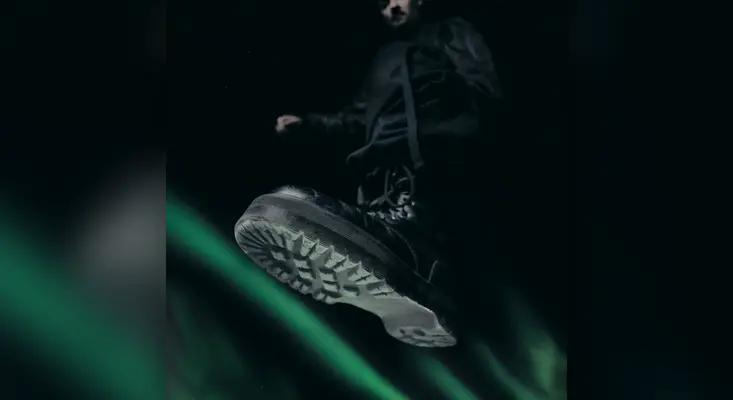 Justin Hawkes - Stomp Official single cover artwork for Stomp by Justin Hawkes, featuring a dark cinematic visual of a black boot stomping down over a green neon motion background.