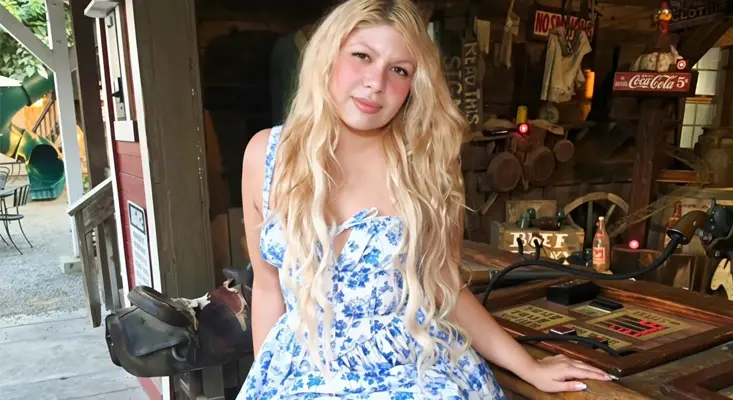 Shaelyn Avalon's new single "Lolita," produced with Spencer Daniels, drops tonight. Shaelyn Avalon sits in a rustic country setting, reflecting on her new single "Lolita" produced with Spencer Daniels.