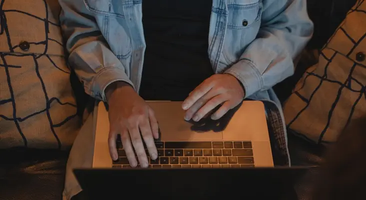 An indie musician drafts a release story and artist message to help listeners connect with a new song. Independent artist writing a release story and artist message before a streaming debut.