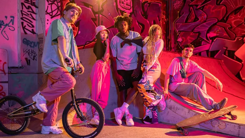 Hip-Hop fashion empowers self-expression through streetwear, creativity, and individuality in urban culture. Young artists wearing Hip-Hop streetwear gather at an urban skatepark, showcasing modern fashion and self-expression.