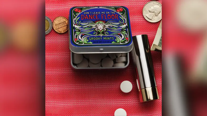 Cover art for Carly Rae Jepsen's "Don't Leave Me on the Dance Floor" showing a retro mint tin with art nouveau design on a red background.