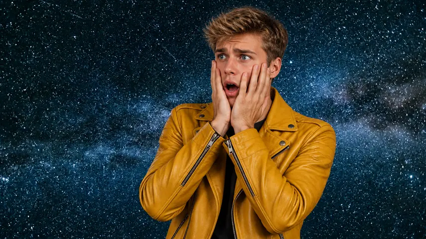 What is Venus Retrograde, shocked artist reacting against a starry night sky background.